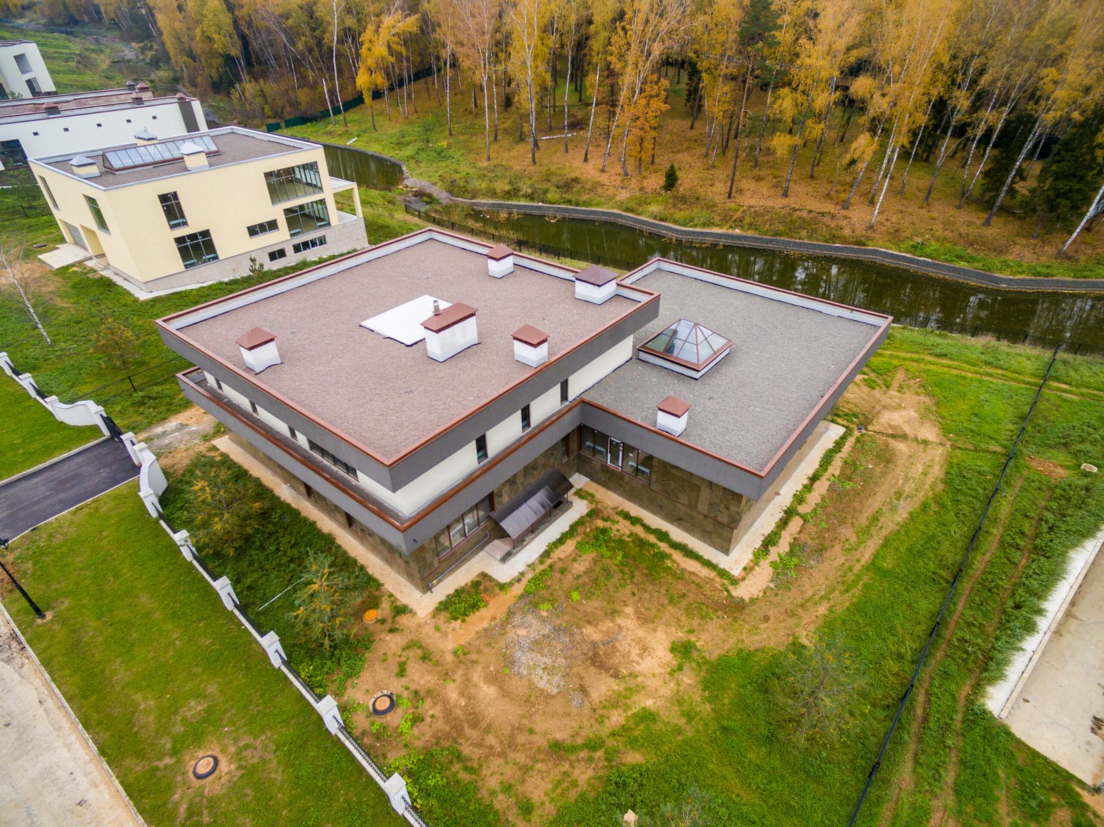 Modern country houses under construction as seen from air